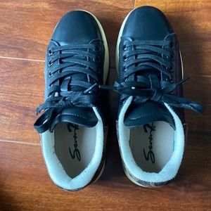 Seven Brand black sneakers with leopard detail